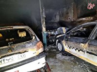آتش‌سوزی در یک تعمیرگاه خودرو در تهران/ عکس