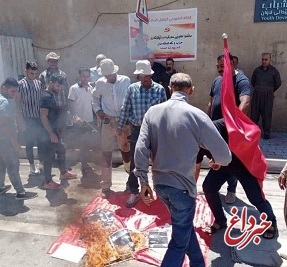 عراقی‌های معترض پرچم ترکیه را آتش‌ زدند