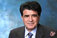 محمدرضا شجریان در کنار دیوار برلین پیش از فروپاشی+ عکس
